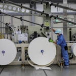 Japan manufacturers stay upbeat on chip demand, services hit by costs