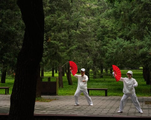 Tai chi practitioners seek balance and well-being in fast-paced Beijing
