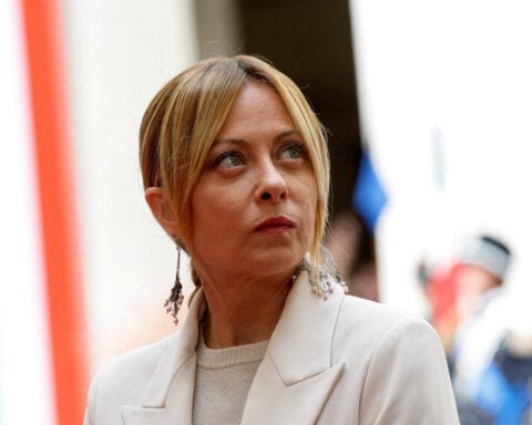 Italy's coalition vows to pursue election law reform after setback