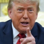 The Latest: Trump says ICE should continue traffic stops despite new policy to halt them