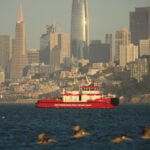 Rescuers are still searching for 3 people after a boat sank in San Francisco Bay, leaving 1 dead
