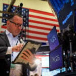 Wall St opens higher as investors weigh earnings; PayPal jumps