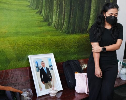 The band playing when a Bangkok bar caught fire mourns its members among the 33 dead