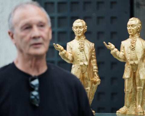A horde of golden mini-Mozarts marks 270 years since the composer's birth in Salzburg
