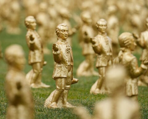 A horde of golden mini-Mozarts marks 270 years since the composer's birth in Salzburg