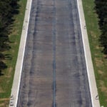 Drained Reflecting Pool reveals Trump's 'American flag blue' liner is now closer to gray