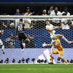Soccer-Holders Argentina beat England 2-1 to set up World Cup final against Spain