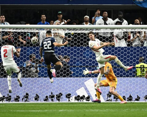 Soccer-Holders Argentina beat England 2-1 to set up World Cup final against Spain