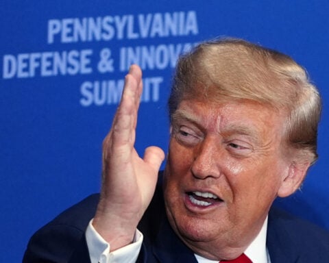 Trump drifts into campaign topics while addressing defense technology gathering