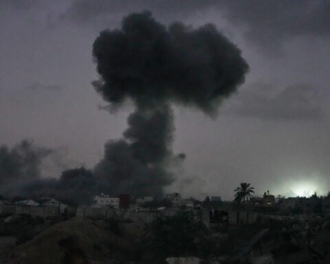 Israel's latest strikes kill a dozen people in Gaza, including police officers