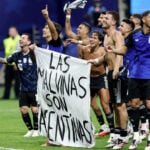 Soccer-Argentine players brandish political Falklands flag after England match