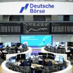 European shares muted as investors weigh earnings, Mideast conflict