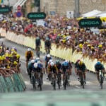 Merlier wins crash-marred 12th stage of the Tour de France, Pogacar retains overall lead