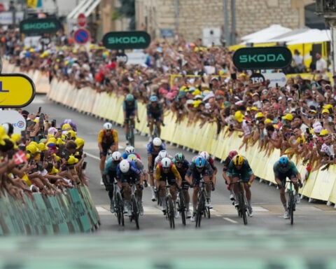Merlier wins crash-marred 12th stage of the Tour de France, Pogacar retains overall lead