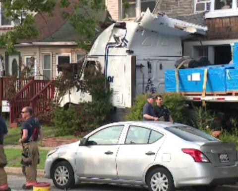 Tractor-trailer goes off road, slams into homes