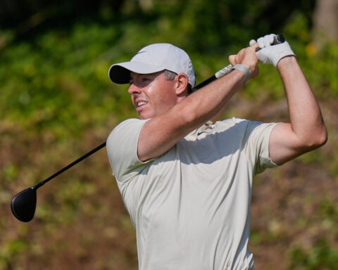 Rory McIlroy toils at British Open as putting woes leave him 7 shots off the first-round lead