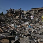 Russian and Ukrainian attacks kill at least 13, officials say