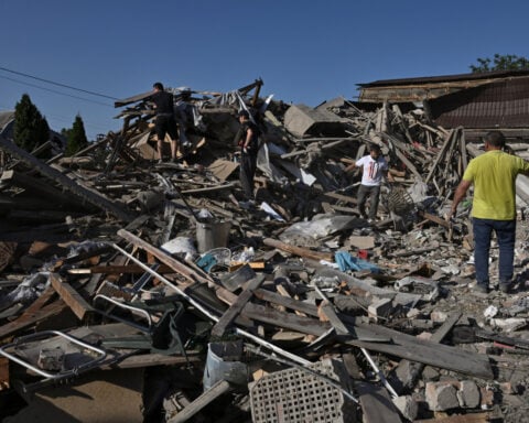 Russian and Ukrainian attacks kill at least 13, officials say