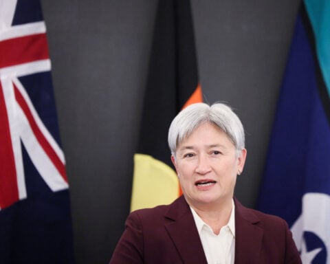 Australia summons Laos ambassador, calls for serious charges in backpacker methanol deaths