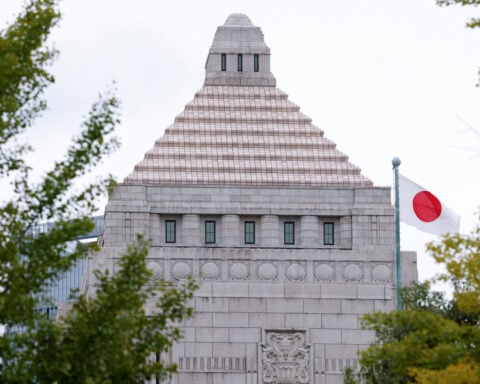 Japan's ruling party warns about suspected collusion between activist investors and private equity
