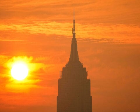 Smoke, fire, floods: US faces triple extreme summer weather threats