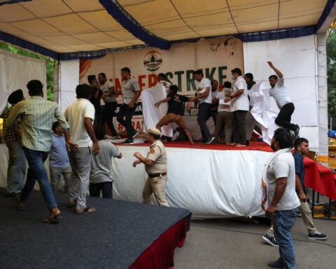 India moves fasting activist to hospital, police say