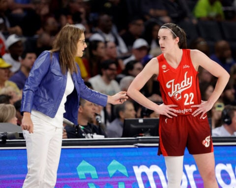 Caitlin Clark bounces into record books with 45 points and 10 assists