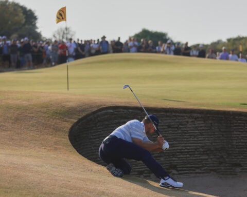 DeChambeau feels the love from fans at the British Open and stays in contention for claret jug