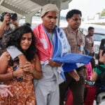 Cuban artist and dissident exiled from country after 5 years in prison arrives in U.S.