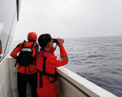 Rescuers in Indonesia find mother and son survivors from sunken passenger boat