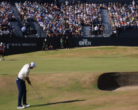 Scottie Scheffler gets bad bounces and a big break. It adds to a close call at British Open