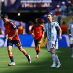 Soccer-Spain battle past 10-man Argentina 1-0 in extra time to win World Cup