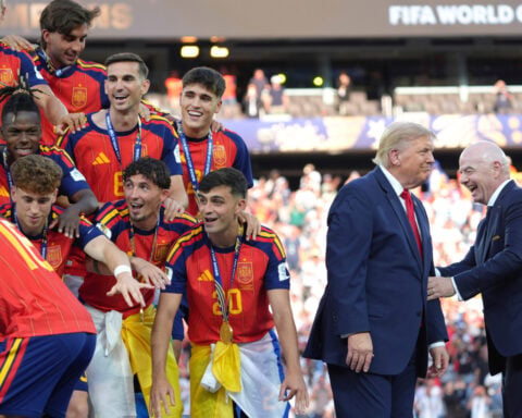 Trump celebrates the World Cup as a US victory as he presents trophy to the winner, Spain