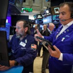 Wall St set to open higher as chips recover, megacap earnings loom