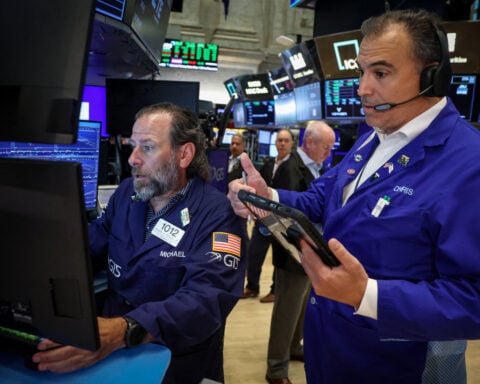 Wall Street indexes fall, with Iran and earnings season in focus