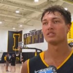 This Hawkeye hooper doubles as a pig farmer