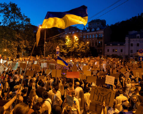 Ukraine's Zelenskiy meets commanders as street protests mount