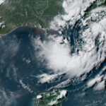 Tropical depression nearing US Gulf Coast set to become a tropical storm, forecasters say