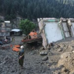 Rescue crews in Afghanistan search for missing, dead in rubble left by flash flooding
