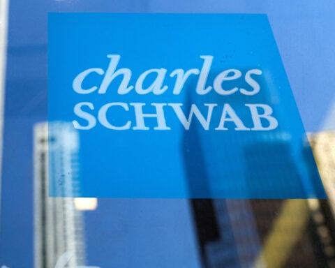 Charles Schwab posts record quarterly profit on trading boom