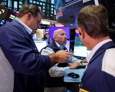 Wall St opens higher as chip stocks extend recovery; earnings in focus