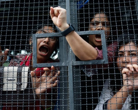 Thousands protest in India after clashes, despite Modi assuring action on exams