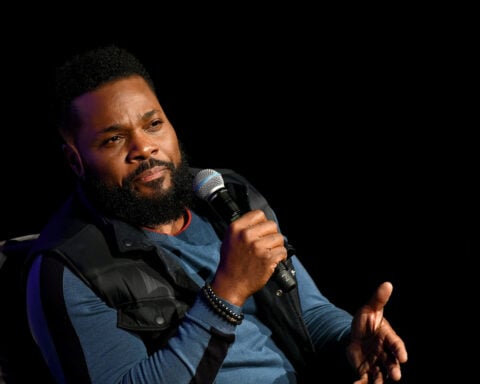 Malcolm-Jamal Warner died tragically one year ago. Now his widow is suing his mother