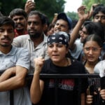 Under soaring pressure, India's education minister promises reforms and debate