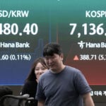 Asian shares edge higher after Wall Street climb, even as Brent oil keeps rising