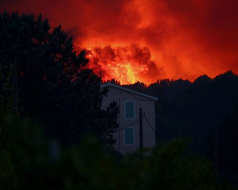Fast-moving wildfire in southern France forces hundreds to flee