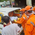 Toxic gas slows efforts to rescue 13 workers trapped in India hydropower tunnel