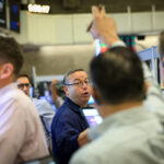 Wall St futures edge lower as caution builds ahead of Big Tech earnings