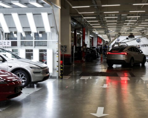 Shanghai holds compliance guidance meeting with automakers including Tesla, BYD