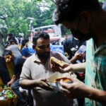 Food, fury and supporters near and far keep India protest alive